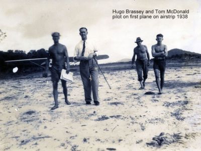hugo brassey and tom mcdonals  pilot on first plane  on airstrip courtesy morris family